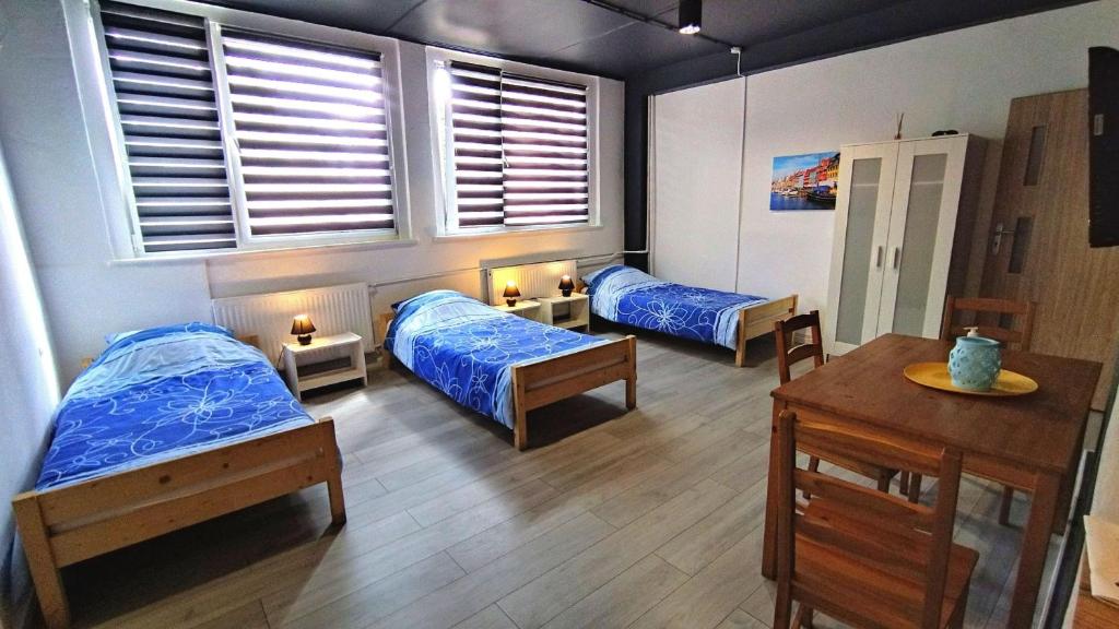 Postel nebo postele na pokoji v ubytování Smart Stay Hostel Gdynia