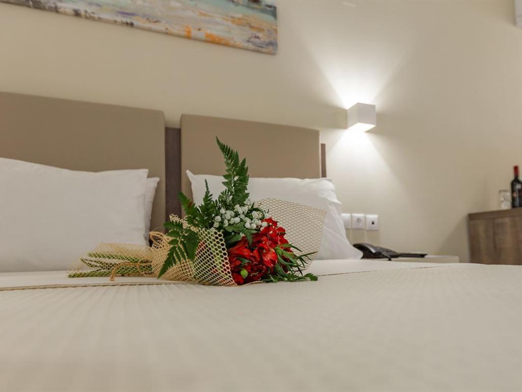 Postel nebo postele na pokoji v ubytování Harmony Rethymno Beach