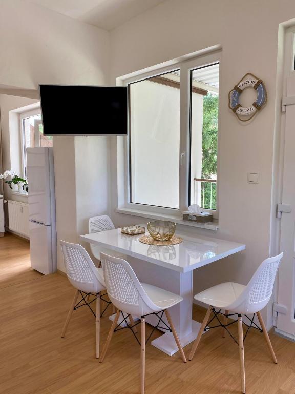 Telewizja i/lub zestaw kina domowego w obiekcie Apartmán Linda Slapy- Ždáň
