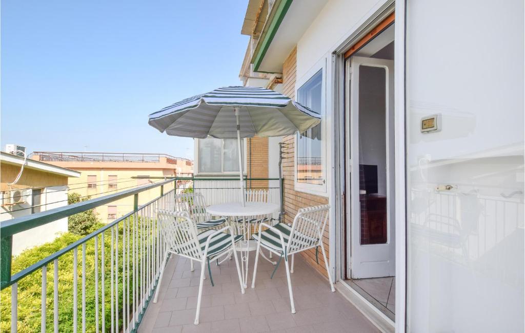 A balcony or terrace at 2 Bedroom Lovely Apartment In Siponto