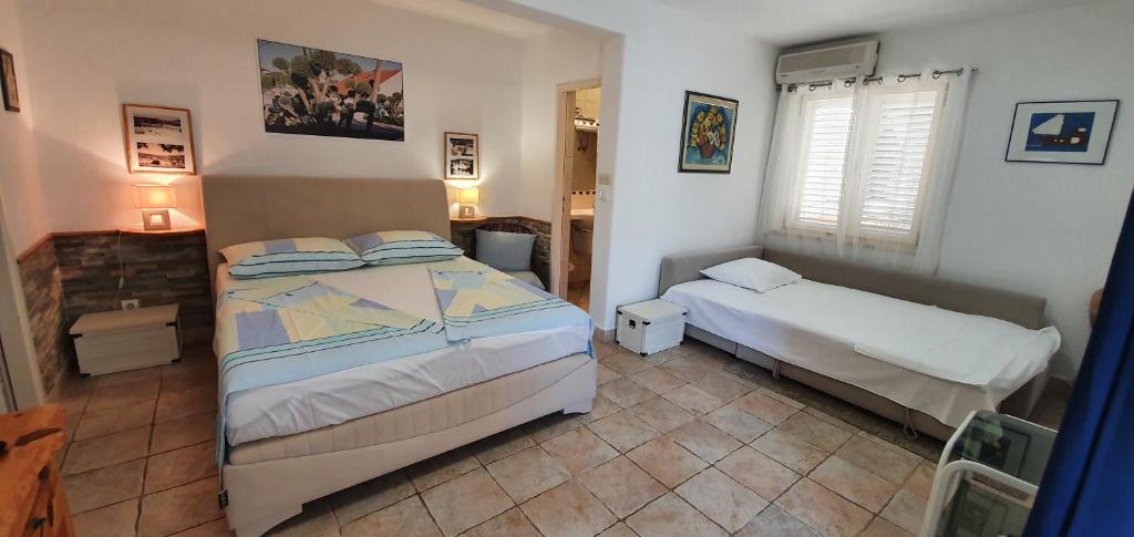 Кровать или кровати в номере Apartman Šego