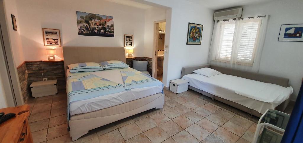 Кровать или кровати в номере Apartman Šego