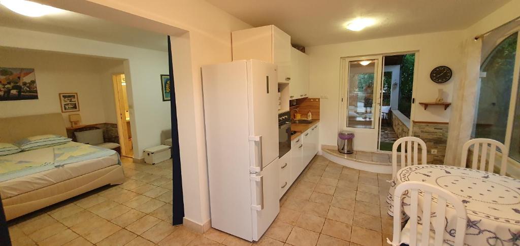 Кровать или кровати в номере Apartman Šego