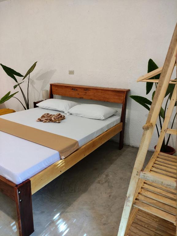 Postel nebo postele na pokoji v ubytování Sunlit Hostel