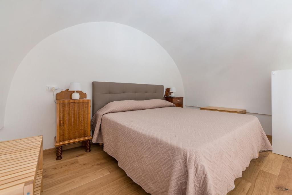 Postel nebo postele na pokoji v ubytování La Vite Bianca