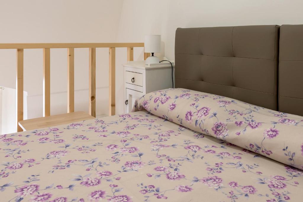 Postel nebo postele na pokoji v ubytování La Vite Bianca