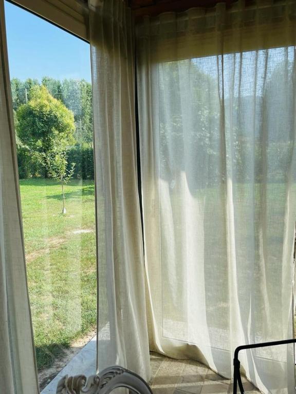 Vonkajšia záhrada v ubytovaní B&B La Rosa Nel Verde