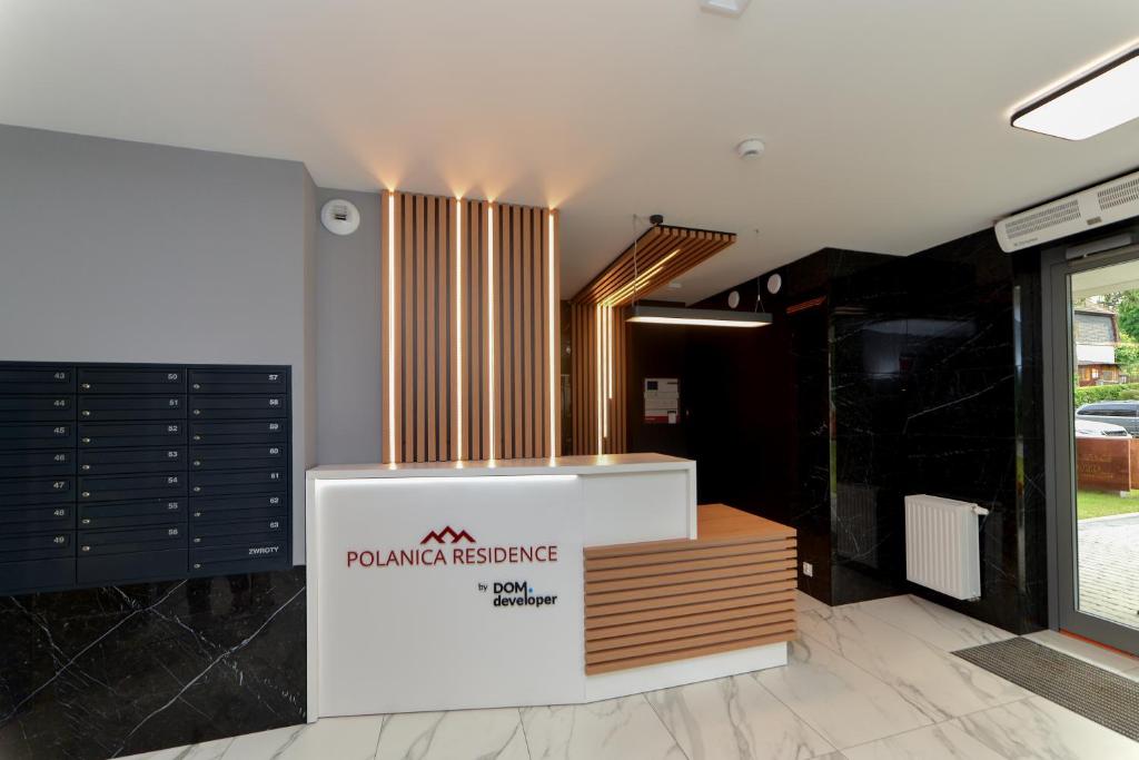 Lobby alebo recepcia v ubytovaní LAGUNA Apartament Polanica Residence 17