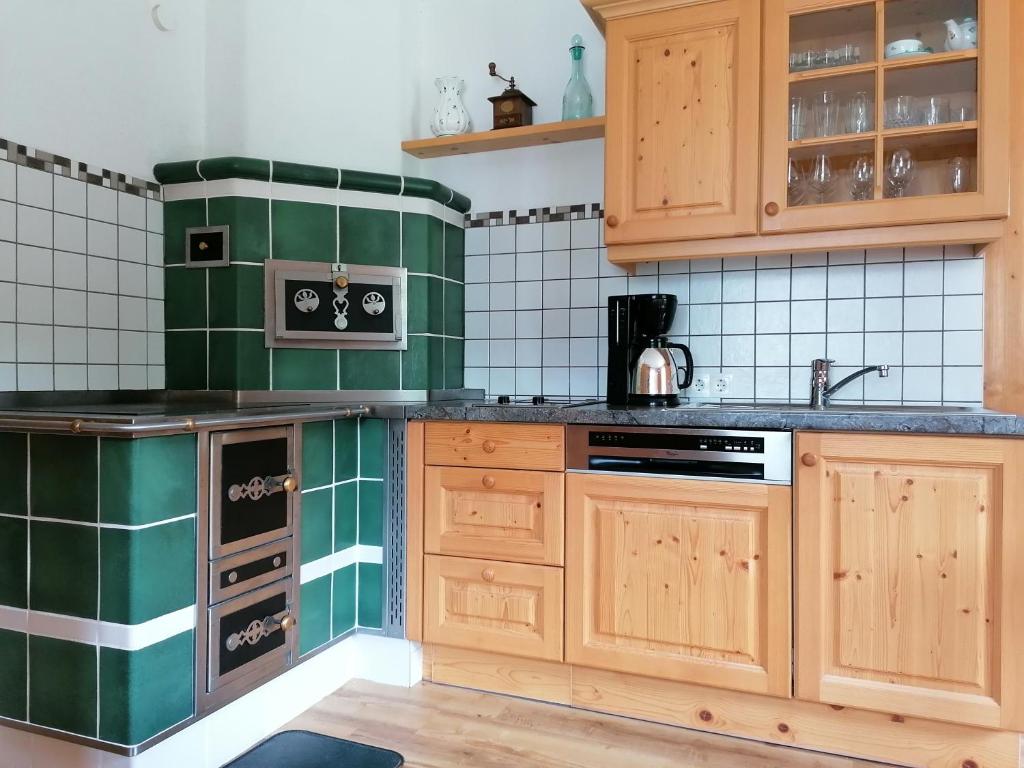 Kuchyň nebo kuchyňský kout v ubytování Ferienhütte Antonia