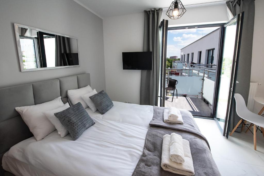 Posteľ alebo postele v izbe v ubytovaní Estella Apartment