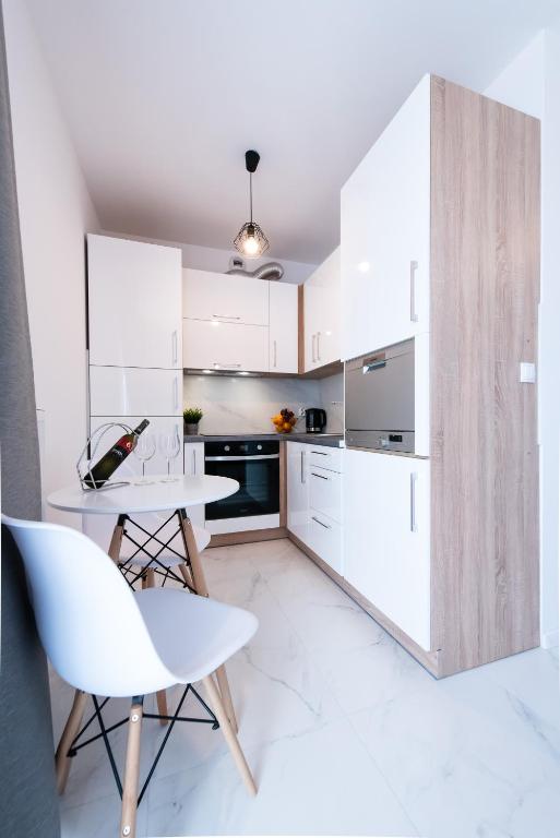 Kuchyňa alebo kuchynka v ubytovaní Estella Apartment