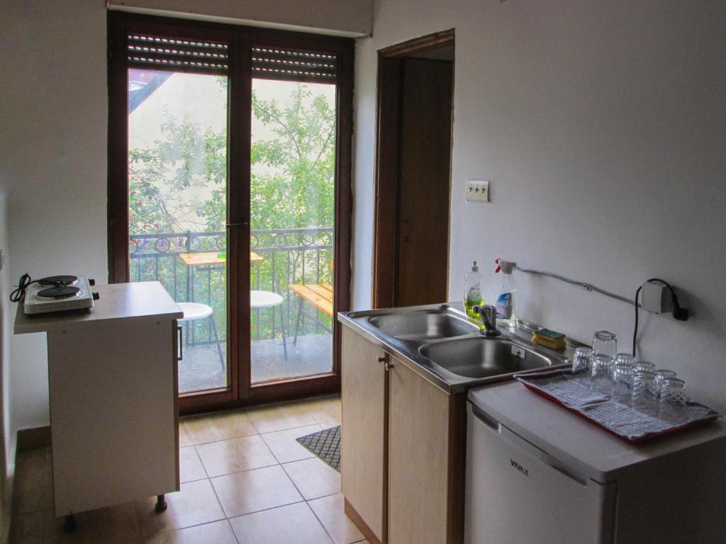 Kuchyň nebo kuchyňský kout v ubytování Guesthouse Mirkovic