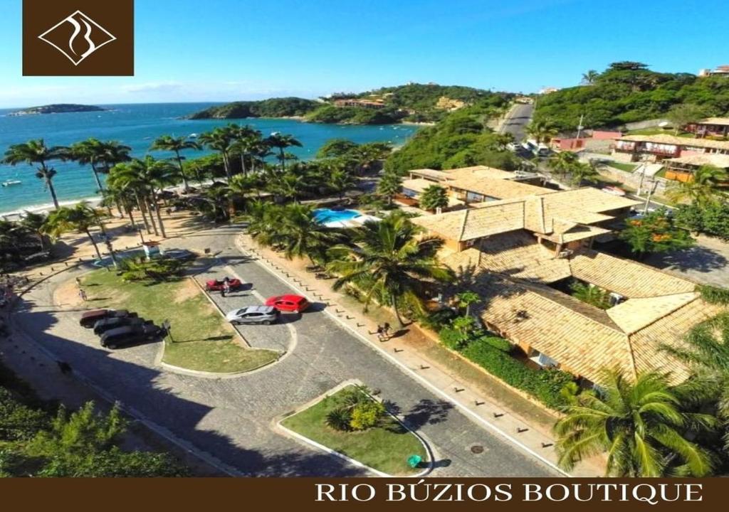 an aerial view of a resort with the ocean at Rio Búzios Boutique Hotel in Búzios