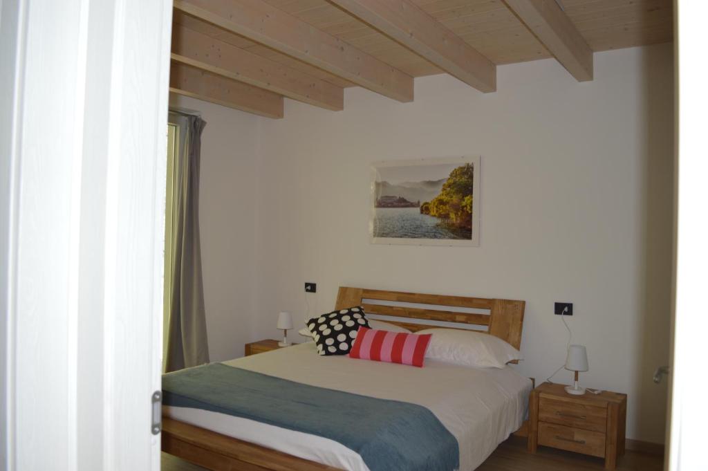 Postel nebo postele na pokoji v ubytování Residence Belvedere & Private Beach