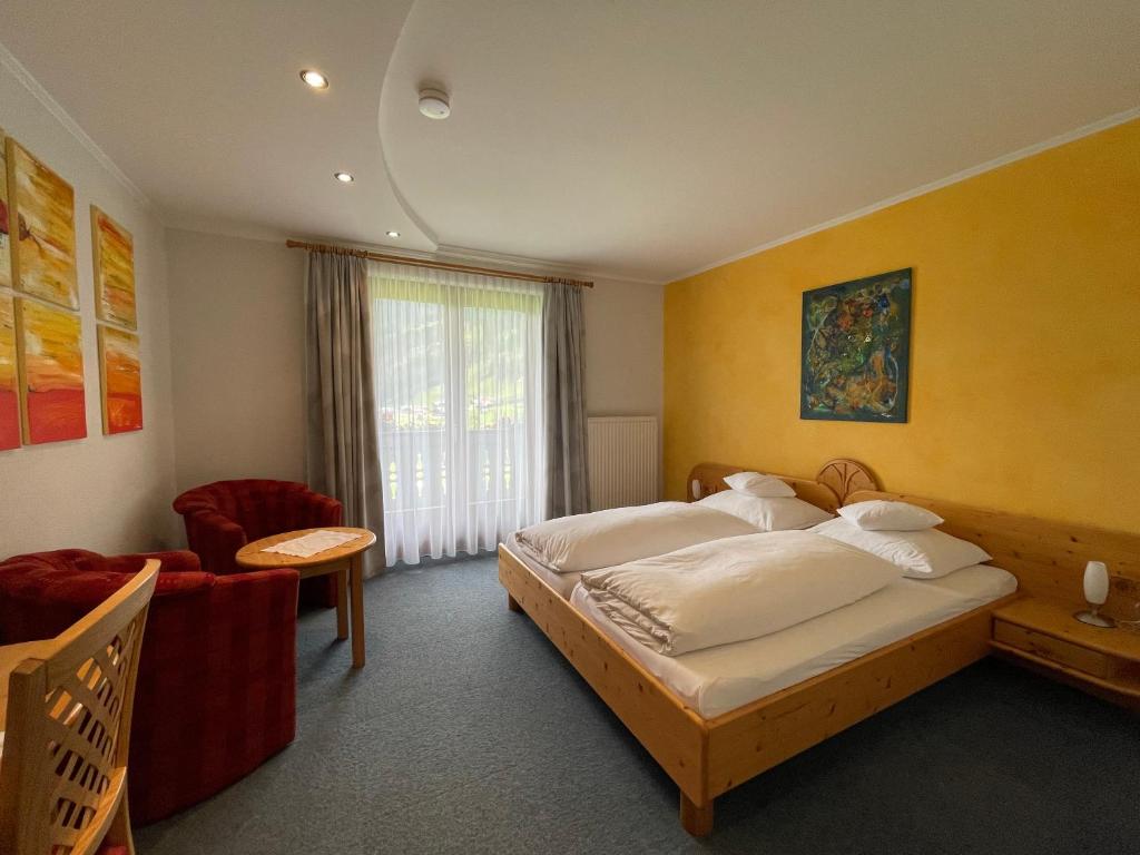 Posteľ alebo postele v izbe v ubytovaní Hotel Garni Burger