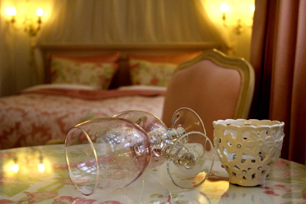Postel nebo postele na pokoji v ubytování Vraa Slotshotel