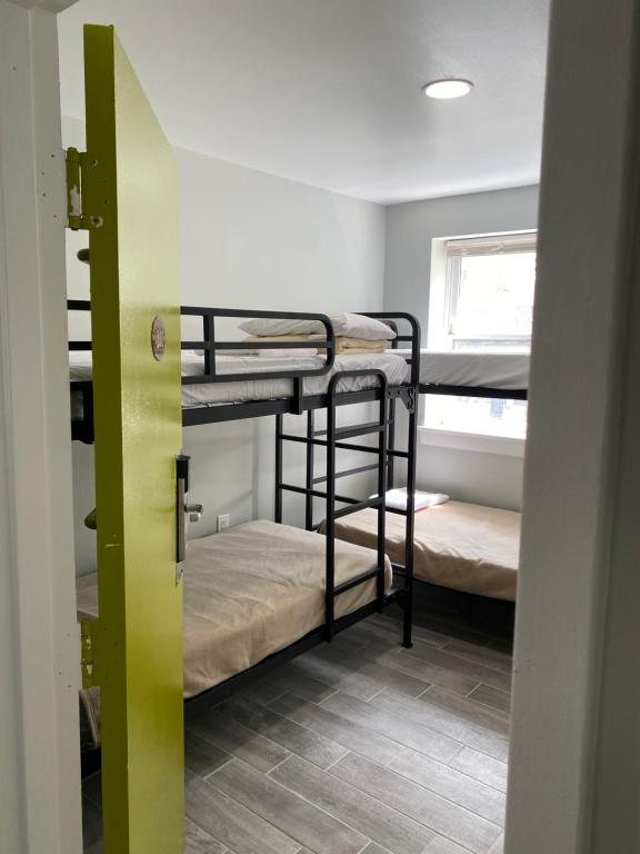 Postel nebo postele na pokoji v ubytování DC International Hostel 1