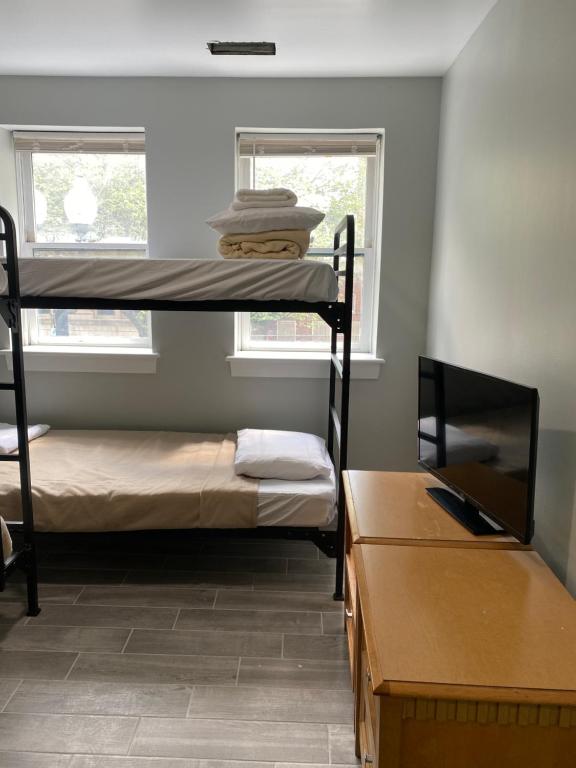 Postel nebo postele na pokoji v ubytování DC International Hostel 1