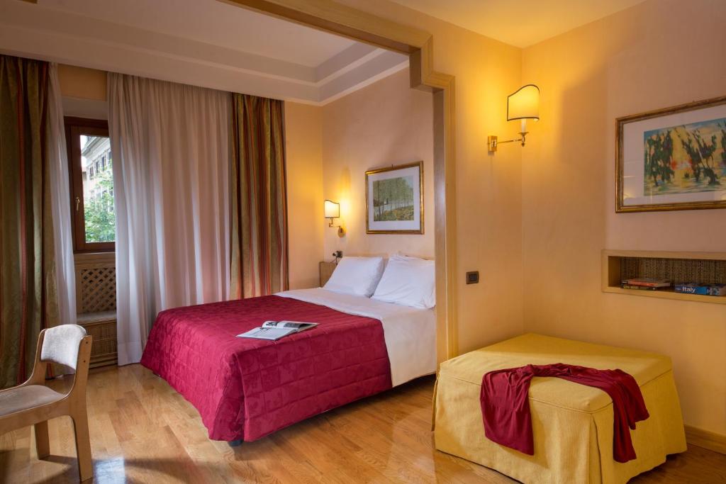 Postel nebo postele na pokoji v ubytování Hotel Oxford