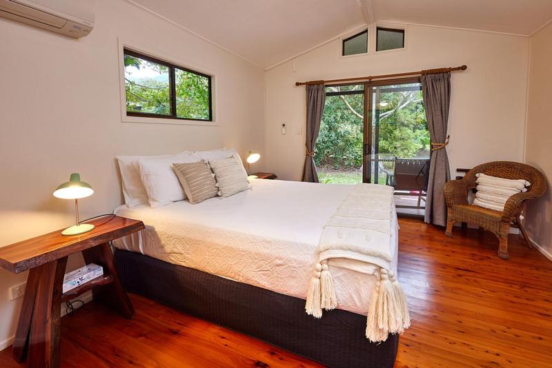 A bed or beds in a room at Cape Trib Farm