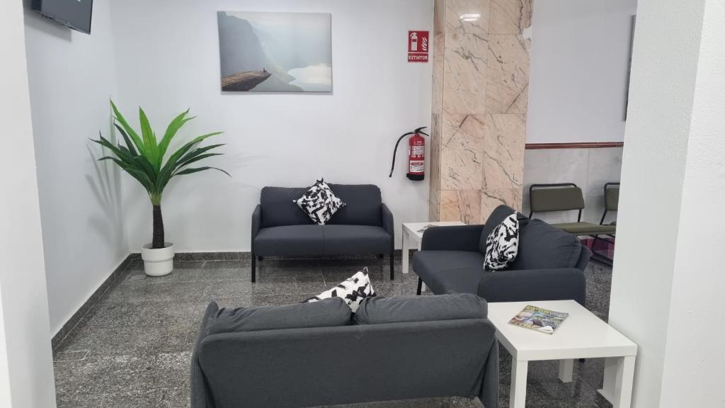 Posezení v ubytování Hostal Nerjasol