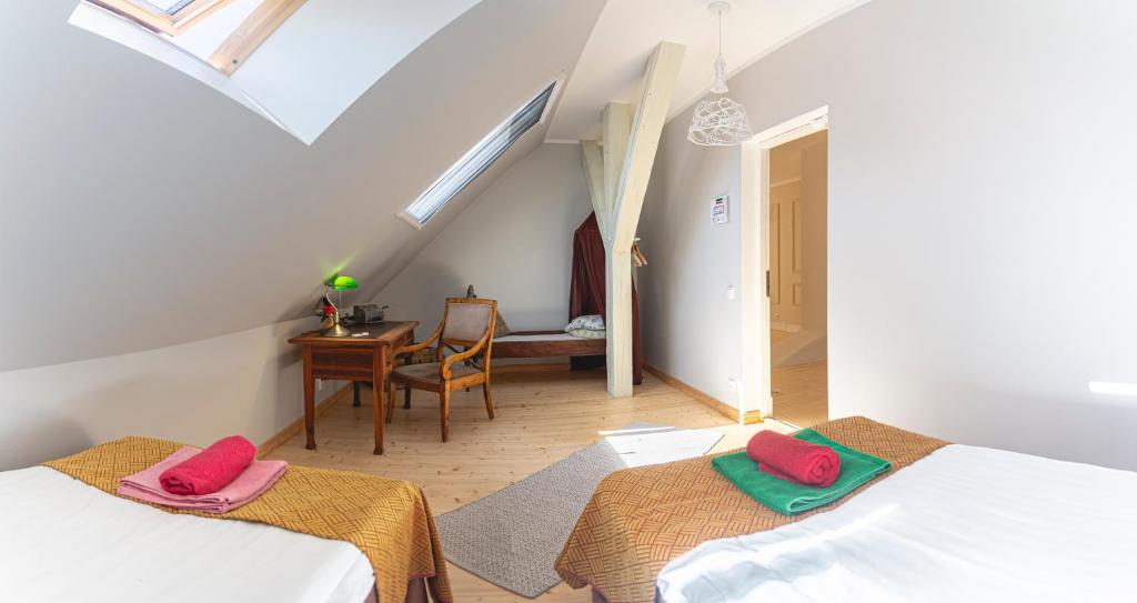 Voodi või voodid majutusasutuse Guesthouse Kadrina Mõis toas