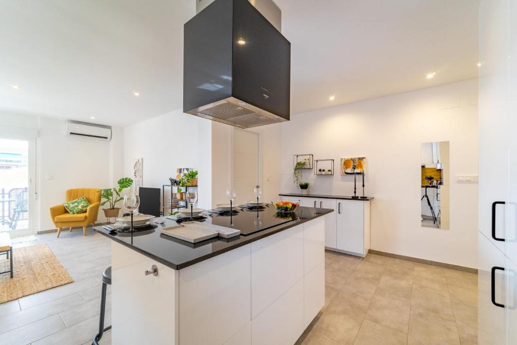 A kitchen or kitchenette at Myflats Premium Santa Pola