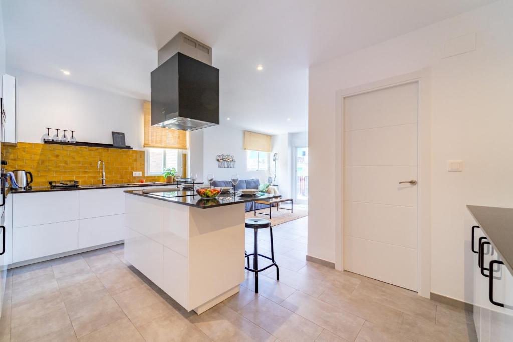 A kitchen or kitchenette at Myflats Premium Santa Pola