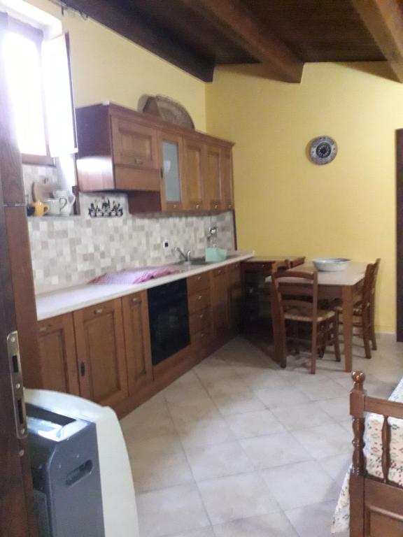 Kuchyň nebo kuchyňský kout v ubytování B&B Corso Italo Balbo