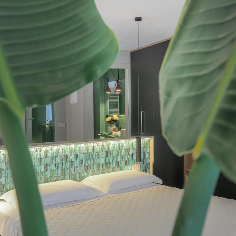 A bed or beds in a room at Dreamers Sea View