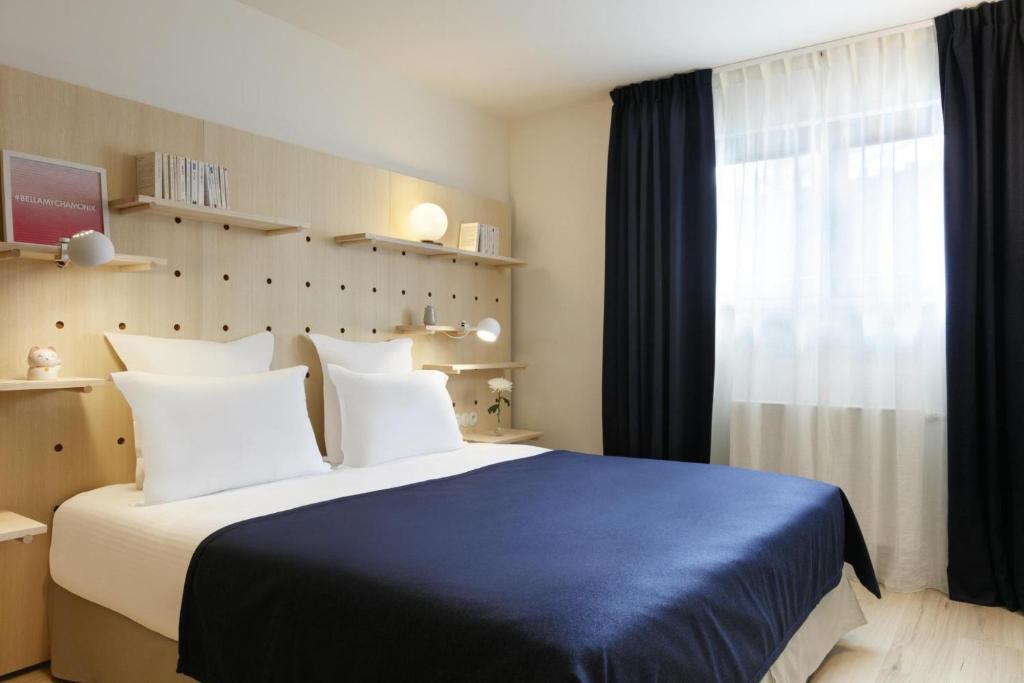 Postel nebo postele na pokoji v ubytování Appart'hôtel Bellamy Chamonix