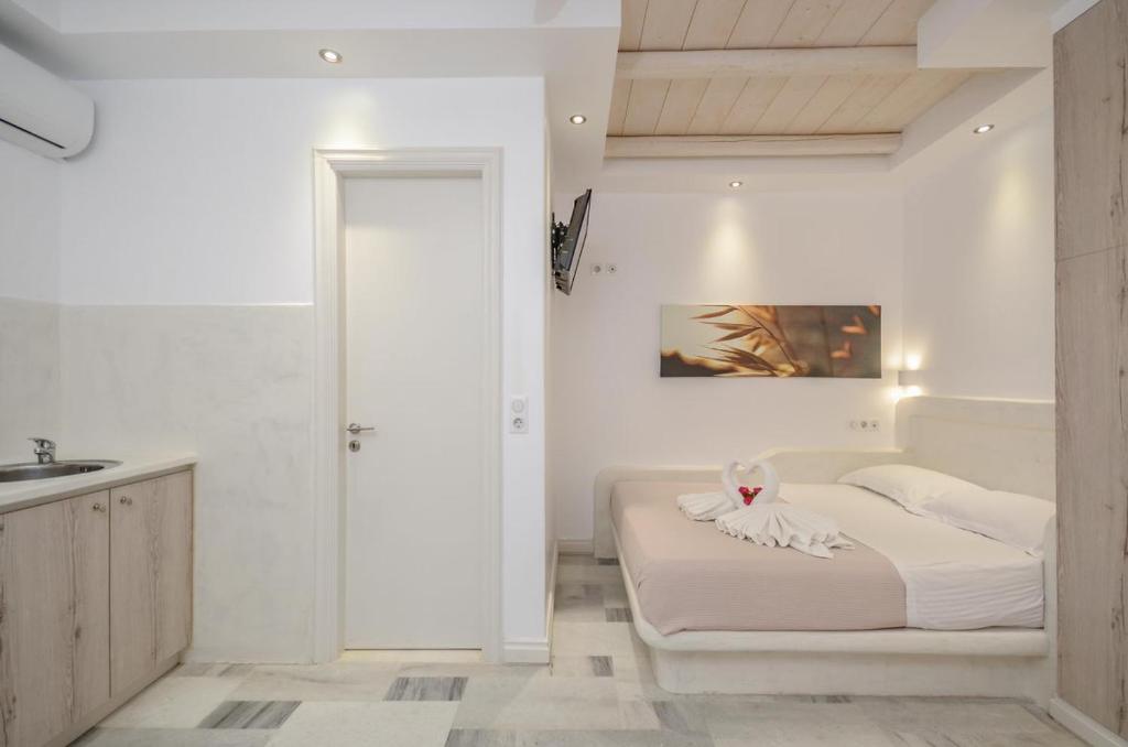 Posteľ alebo postele v izbe v ubytovaní Ostria Hotel