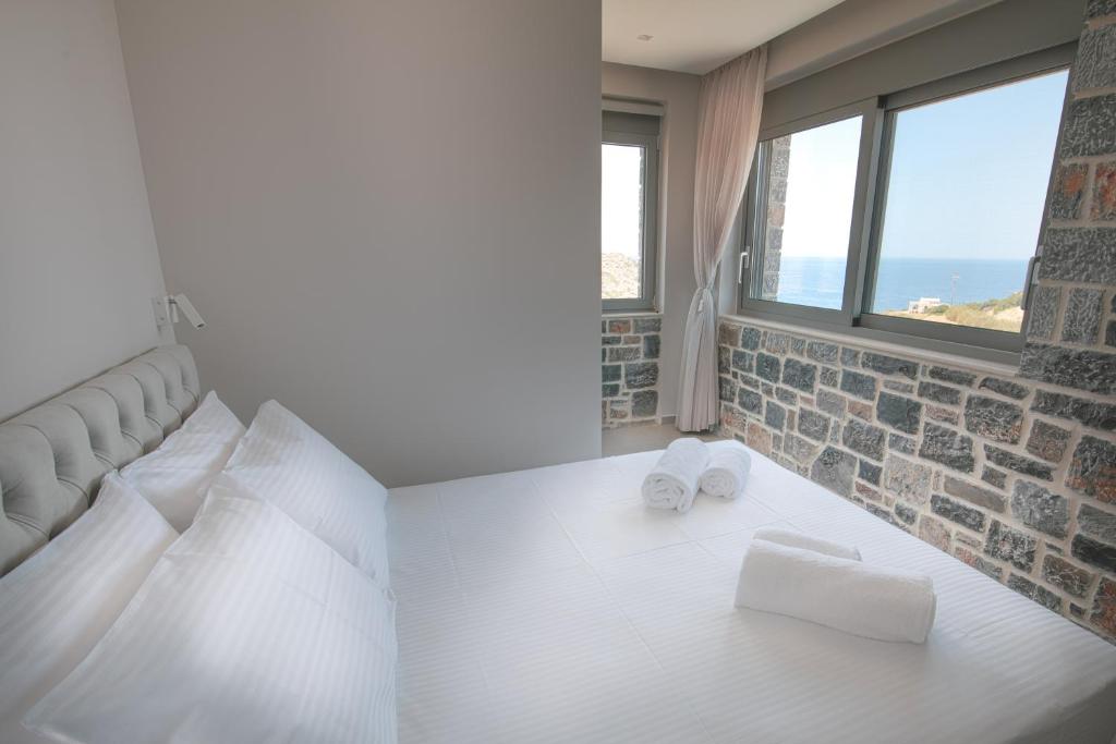 Postel nebo postele na pokoji v ubytování Acantha Villas