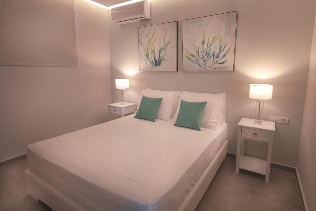 Postel nebo postele na pokoji v ubytování Acantha Villas