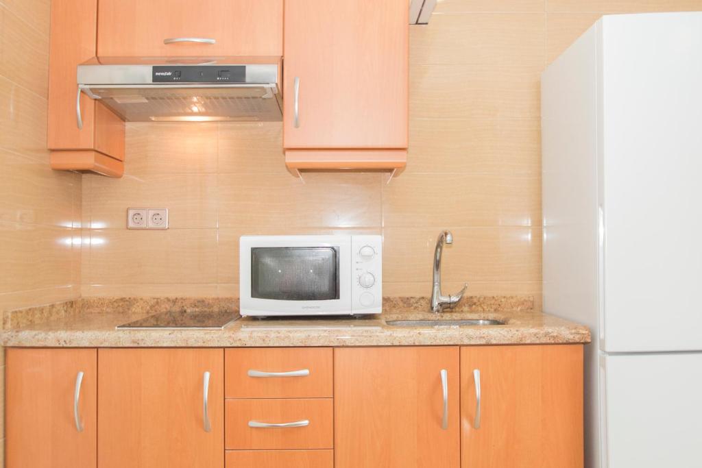 Kuchyňa alebo kuchynka v ubytovaní Viveros Apartments