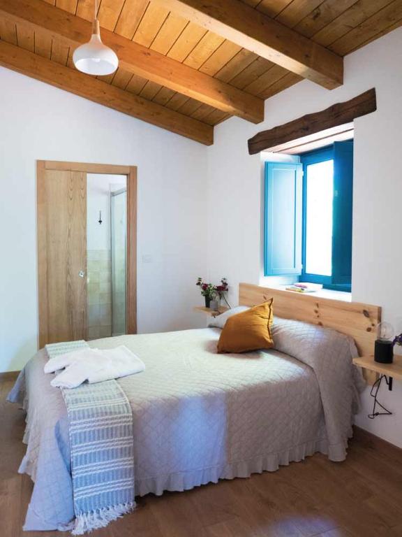 Postel nebo postele na pokoji v ubytování CASA TERRA ALMA