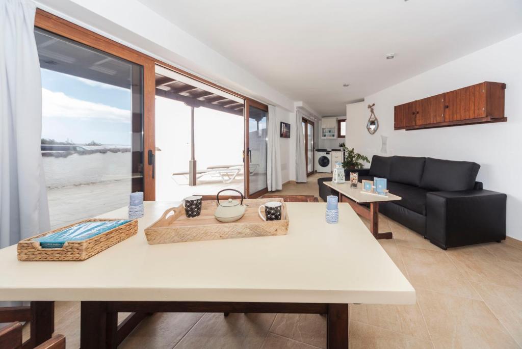 A seating area at TEMISA FAMARA BEACH