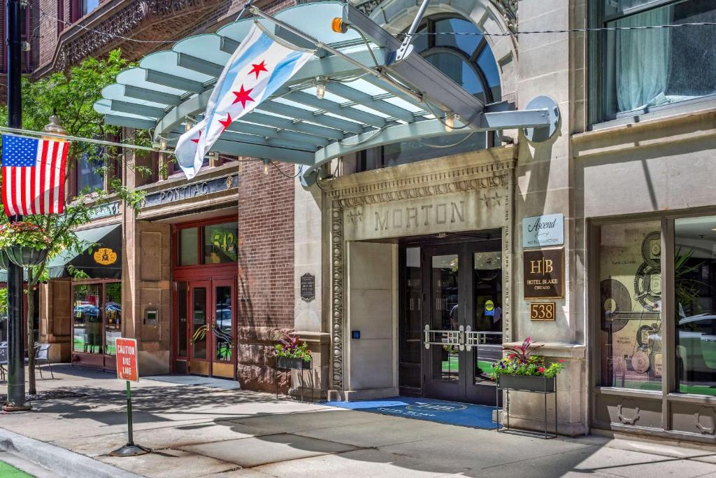 an entrance to a building with an american flag at Bluegreen Vacations Hotel Blake, Ascend Resort Collection in Chicago