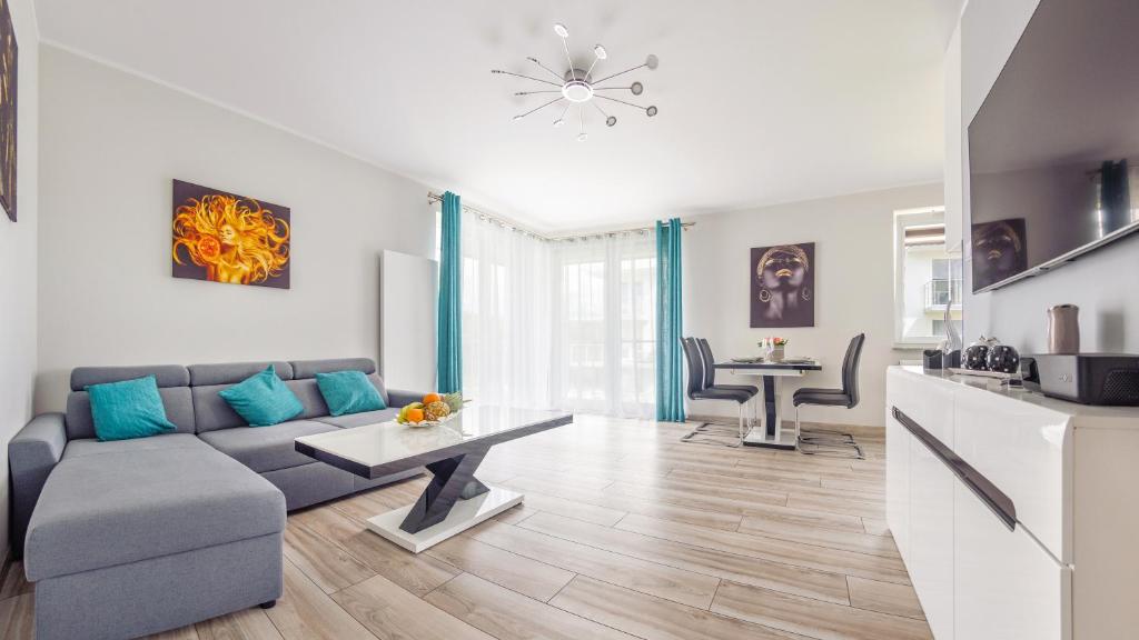 Kuchyňa alebo kuchynka v ubytovaní Prywatne apartamenty Sun & Snow w Porta Mare