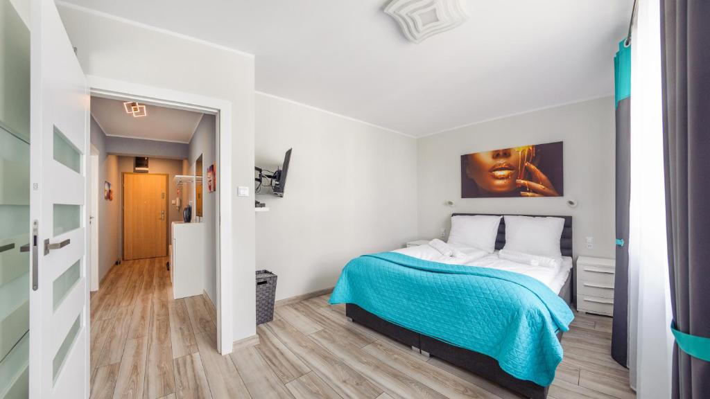 Posteľ alebo postele v izbe v ubytovaní Prywatne apartamenty Sun & Snow w Porta Mare