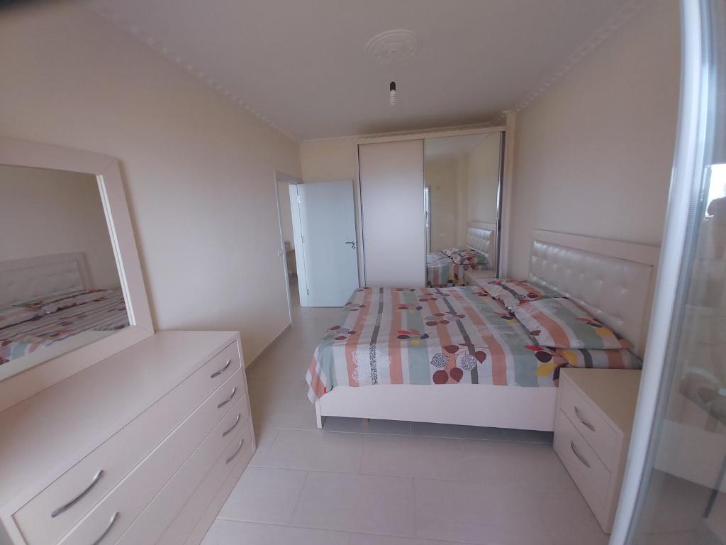 Postel nebo postele na pokoji v ubytování Shengjin-mi casa es tu casa