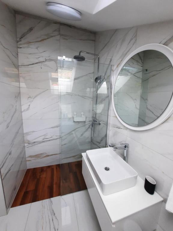 Koupelna v ubytování Apartments Ban