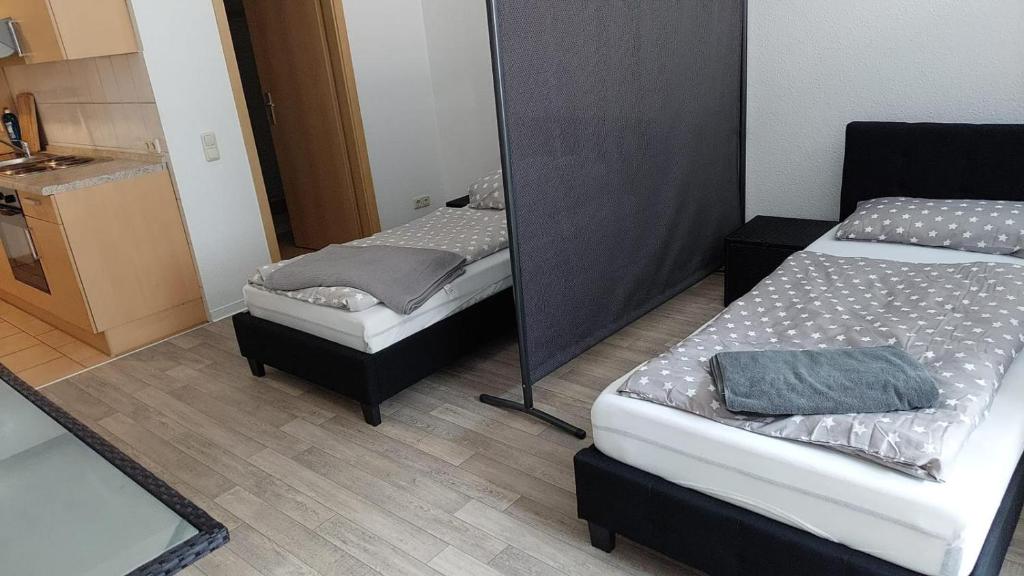 Cama ou camas em um quarto em Monteurzimmer in Neustadt-Glewe