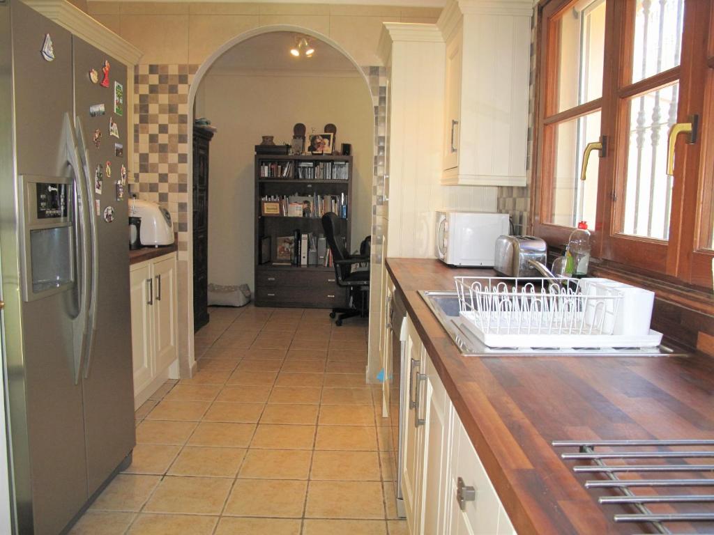 Kuchyň nebo kuchyňský kout v ubytování Alhaurin holiday villa