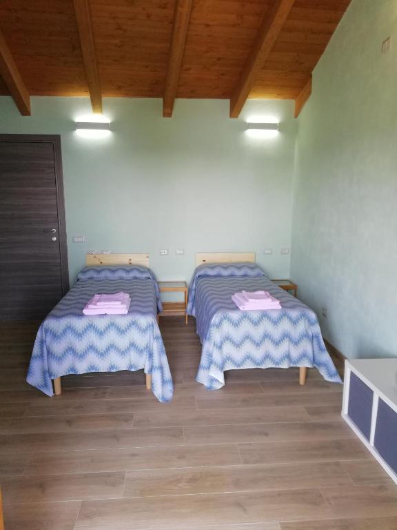 Postel nebo postele na pokoji v ubytování B&B La Plesna