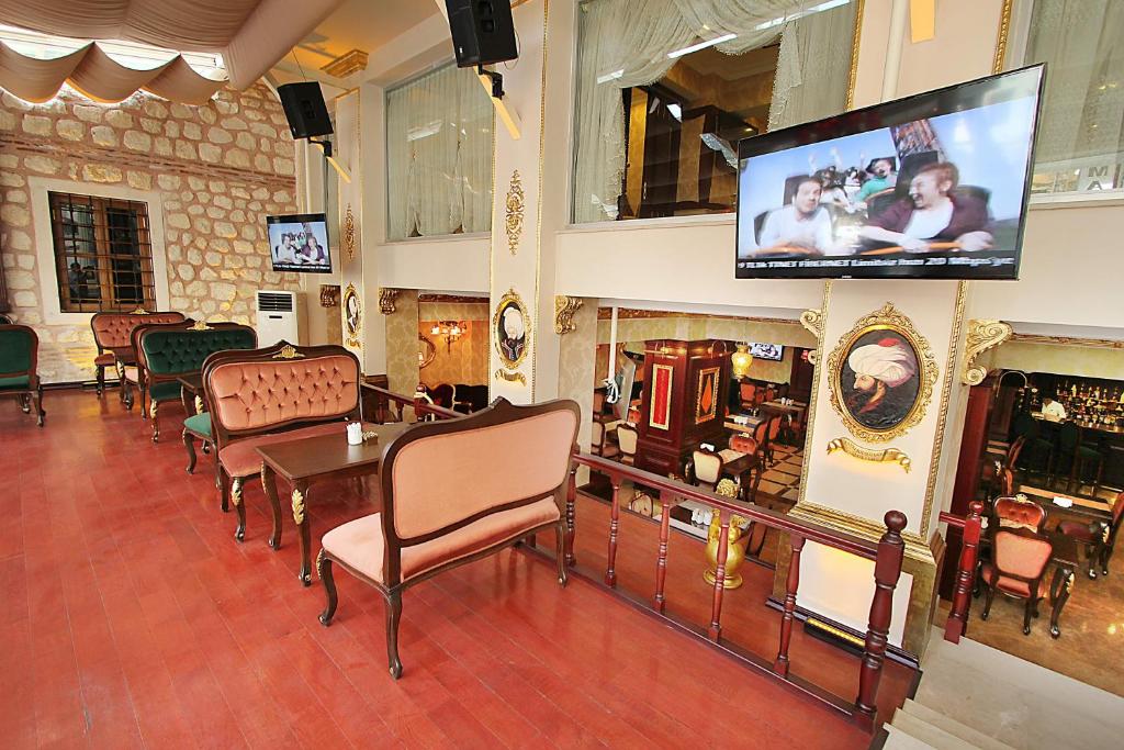 TV a/nebo společenská místnost v ubytování Balin Hotel - Special Category