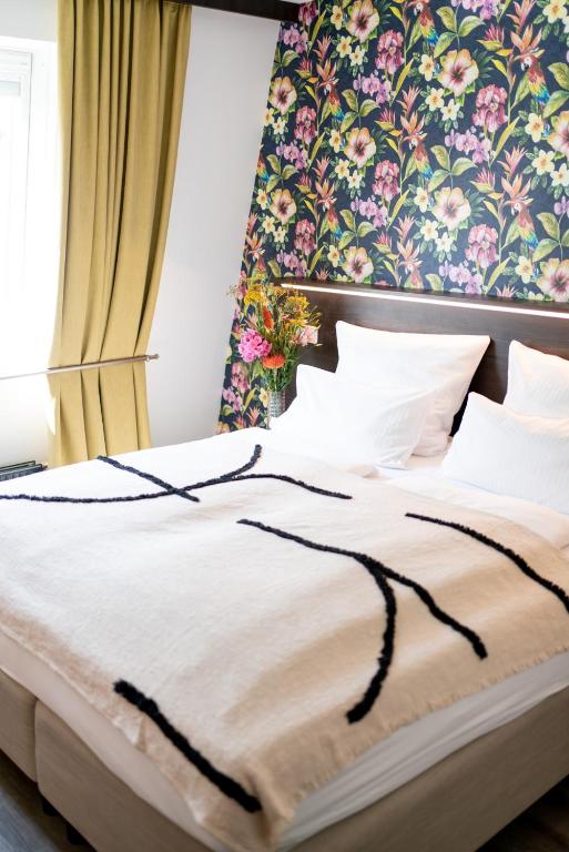 Postel nebo postele na pokoji v ubytování Luxstay Karben - Self-Check-In