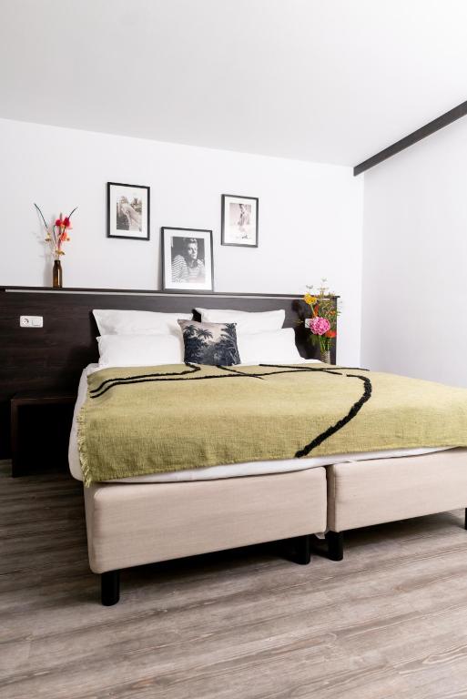 Postel nebo postele na pokoji v ubytování Luxstay Karben - Self-Check-In