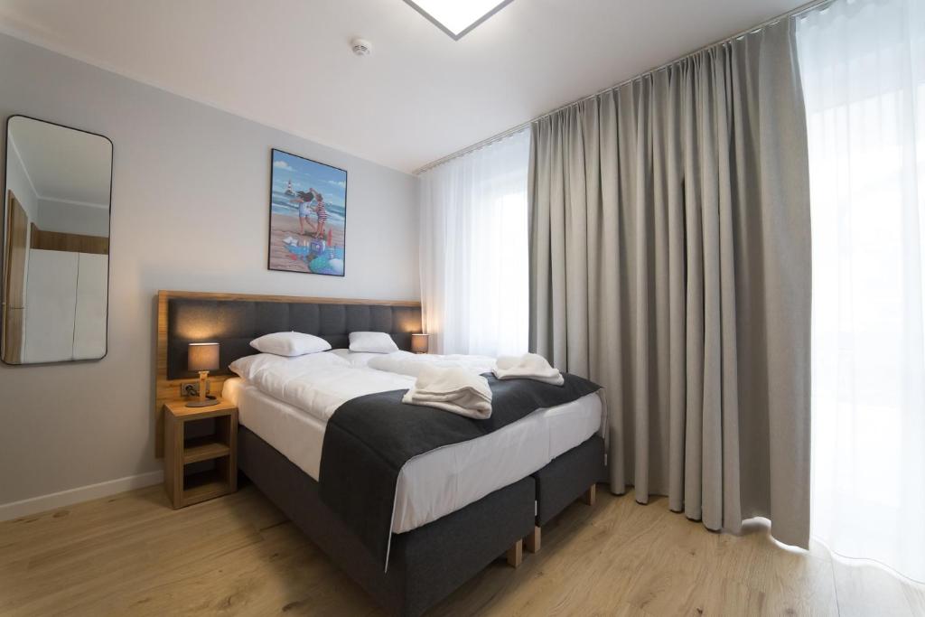 Postel nebo postele na pokoji v ubytování Villa Aura