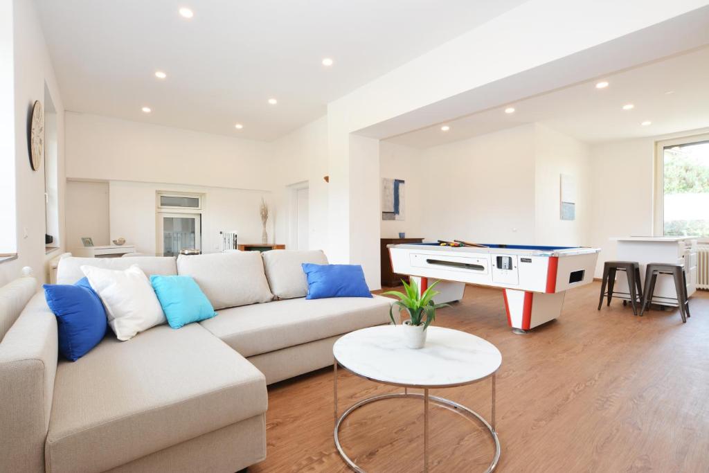 Posezení v ubytování Alpenblick - modernes und großzügiges Apartment